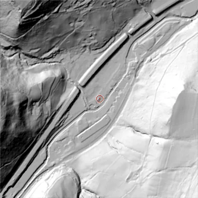 Shaded relief map of the ground around HX76PU, computed from Environment Agency LiDAR. The ground here sits at about 110 m above sea level and falls 150 m across the surrounding 800 m. Surface water reaching this point runs off ground lying to the north-west, 121.3 m higher.