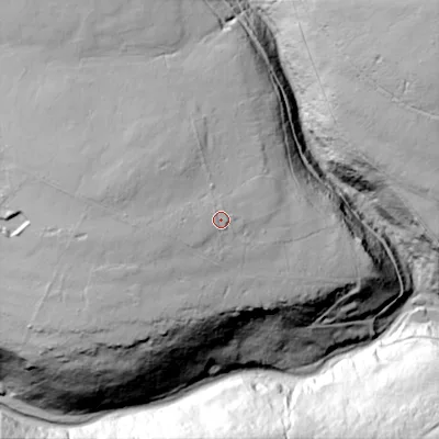 Shaded relief map of the ground around HX77AT, computed from Environment Agency LiDAR. The ground here sits at about 289 m above sea level and falls 78 m across the surrounding 800 m. Surface water reaching this point runs off ground lying to the west, 9.6 m higher.