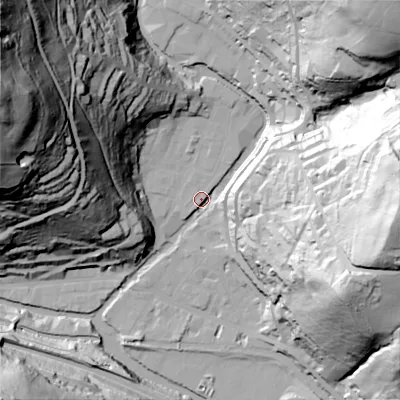 Shaded relief map of the ground around HX77BN, computed from Environment Agency LiDAR. The ground here sits at about 102 m above sea level and falls 141 m across the surrounding 800 m. Surface water reaching this point runs off ground lying to the north-west, 135.2 m higher.