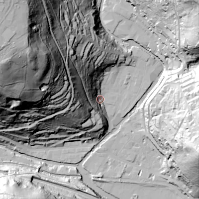 Shaded relief map of the ground around HX77BT, computed from Environment Agency LiDAR. The ground here sits at about 105 m above sea level and falls 153 m across the surrounding 800 m. Surface water reaching this point runs off ground lying to the west-north-west, 63.9 m higher.