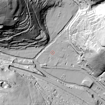 Shaded relief map of the ground around HX78EF, computed from Environment Agency LiDAR. The ground here sits at about 99 m above sea level and falls 145 m across the surrounding 800 m. Surface water reaching this point runs off ground lying to the east, 84.5 m higher.