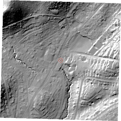 Shaded relief map of the ground around IG101AH, computed from Environment Agency LiDAR. The ground here sits at about 33 m above sea level and falls 43 m across the surrounding 800 m. Surface water reaching this point runs off ground lying to the north-west, 37.1 m higher.