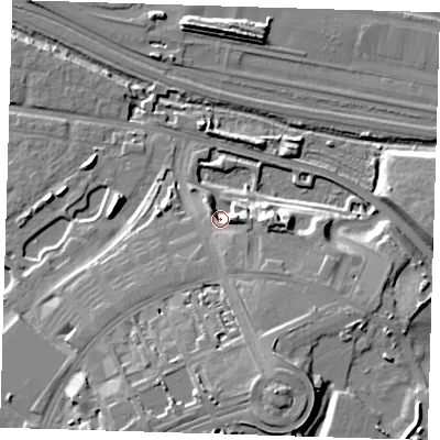 Shaded relief map of the ground around IG110AN, computed from Environment Agency LiDAR. The ground here sits at about 6 m above sea level and falls 18 m across the surrounding 800 m. Surface water reaching this point runs off ground lying to the east, 5.2 m higher.