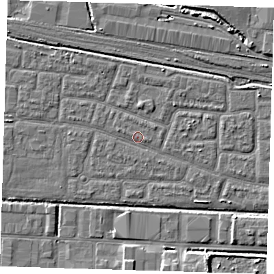 Shaded relief map of the ground around IG110QJ, computed from Environment Agency LiDAR. The ground here sits at about 2 m above sea level and falls 7 m across the surrounding 800 m. Surface water reaching this point runs off ground lying to the south-east, 1.7 m higher.