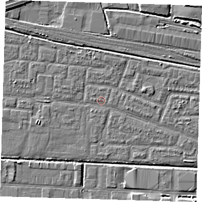 Shaded relief map of the ground around IG110QQ, computed from Environment Agency LiDAR. The ground here sits at about 2 m above sea level and falls 7 m across the surrounding 800 m. Surface water reaching this point runs off ground lying to the south-east, 1.7 m higher.