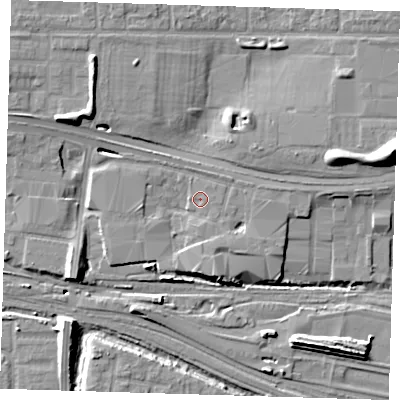 Shaded relief map of the ground around IG110RJ, computed from Environment Agency LiDAR. The ground here sits at about 4 m above sea level and falls 16 m across the surrounding 800 m. Surface water reaching this point runs off ground lying to the south, 3.3 m higher.