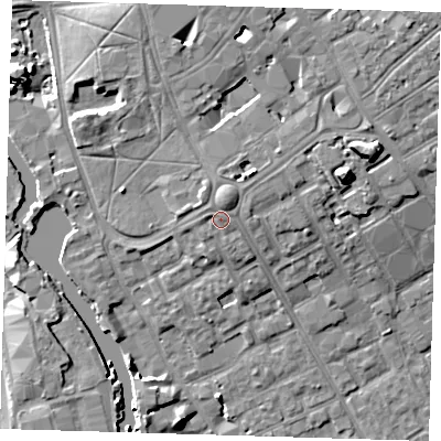 Shaded relief map of the ground around IG117AT, computed from Environment Agency LiDAR. The ground here sits at about 8 m above sea level and falls 11 m across the surrounding 800 m. Surface water reaching this point runs off ground lying to the north-north-east, 1.5 m higher.