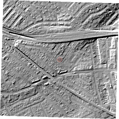 Shaded relief map of the ground around IG117QS, computed from Environment Agency LiDAR. The ground here sits at about 5 m above sea level and falls 8 m across the surrounding 800 m. Surface water reaching this point runs off ground lying to the west-north-west, 3.2 m higher.