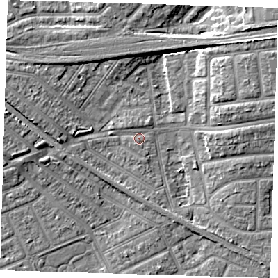 Shaded relief map of the ground around IG117RR, computed from Environment Agency LiDAR. The ground here sits at about 3 m above sea level and falls 8 m across the surrounding 800 m. Surface water reaching this point runs off ground lying to the west, 7.5 m higher.