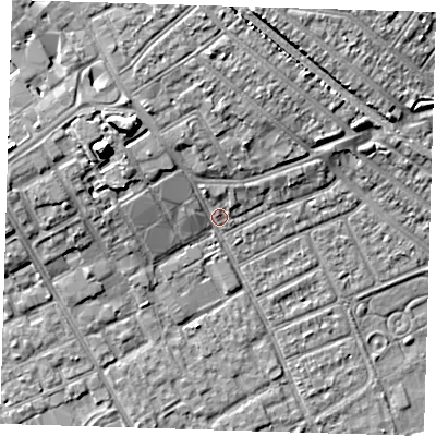 Shaded relief map of the ground around IG117TA, computed from Environment Agency LiDAR. The ground here sits at about 4 m above sea level and falls 11 m across the surrounding 800 m. Surface water reaching this point runs off ground lying to the west-north-west, 8.1 m higher.