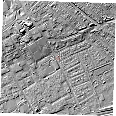 Shaded relief map of the ground around IG117TL, computed from Environment Agency LiDAR. The ground here sits at about 4 m above sea level and falls 12 m across the surrounding 800 m. Surface water reaching this point runs off ground lying to the north, 6.0 m higher.