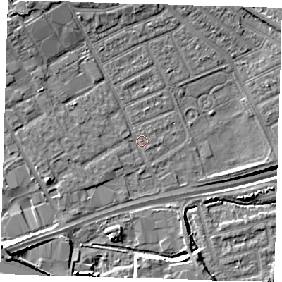 Shaded relief map of the ground around IG117TR, computed from Environment Agency LiDAR. The ground here sits at about 3 m above sea level and falls 14 m across the surrounding 800 m. Surface water reaching this point runs off ground lying to the north-west, 5.6 m higher.