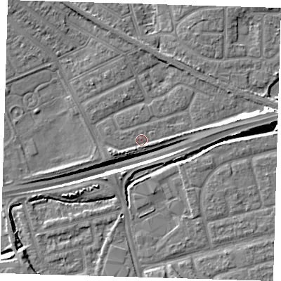 Shaded relief map of the ground around IG117XN, computed from Environment Agency LiDAR. The ground here sits at about 2 m above sea level and falls 14 m across the surrounding 800 m. Surface water reaching this point runs off ground lying to the east-north-east, 6.9 m higher.