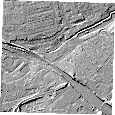 Shaded relief map of the ground around IG118PS, computed from Environment Agency LiDAR. The ground here sits at about 5 m above sea level and falls 9 m across the surrounding 800 m. Surface water reaching this point runs off ground lying to the south-east, 6.1 m higher.
