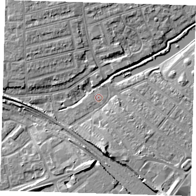 Shaded relief map of the ground around IG118PT, computed from Environment Agency LiDAR. The ground here sits at about 5 m above sea level and falls 9 m across the surrounding 800 m. Surface water reaching this point runs off ground lying to the south, 6.6 m higher.