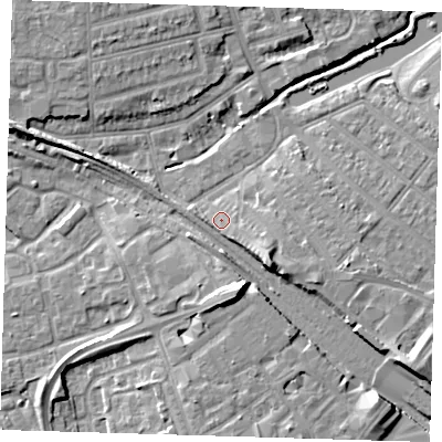 Shaded relief map of the ground around IG118QT, computed from Environment Agency LiDAR. The ground here sits at about 7 m above sea level and falls 9 m across the surrounding 800 m. Surface water reaching this point runs off ground lying to the south-east, 5.4 m higher.