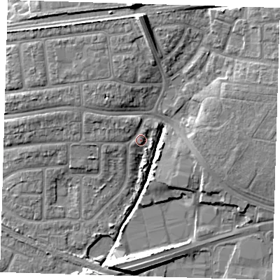 Shaded relief map of the ground around IG119SA, computed from Environment Agency LiDAR. The ground here sits at about 5 m above sea level and falls 12 m across the surrounding 800 m. Surface water reaching this point runs off ground lying to the west-north-west, 2.2 m higher.