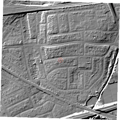 Shaded relief map of the ground around IG119SS, computed from Environment Agency LiDAR. The ground here sits at about 5 m above sea level and falls 11 m across the surrounding 800 m. Surface water reaching this point runs off ground lying to the north-east, 2.9 m higher.