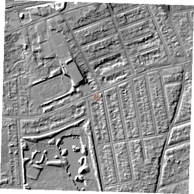 Shaded relief map of the ground around IG11LQ, computed from Environment Agency LiDAR. The ground here sits at about 9 m above sea level and falls 8 m across the surrounding 800 m. Surface water reaching this point runs off ground lying to the north, 5.4 m higher.