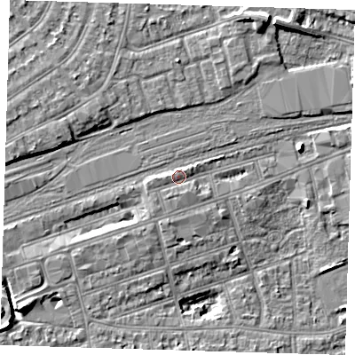 Shaded relief map of the ground around IG11TS, computed from Environment Agency LiDAR. The ground here sits at about 12 m above sea level and falls 8 m across the surrounding 800 m. Surface water reaching this point runs off ground lying to the south-south-west, 1.1 m higher.