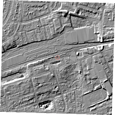 Shaded relief map of the ground around IG11TT, computed from Environment Agency LiDAR. The ground here sits at about 11 m above sea level and falls 9 m across the surrounding 800 m. Surface water reaching this point runs off ground lying to the west-south-west, 1.8 m higher.