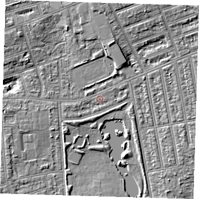 Shaded relief map of the ground around IG11YE, computed from Environment Agency LiDAR. The ground here sits at about 9 m above sea level and falls 6 m across the surrounding 800 m. Surface water reaching this point runs off ground lying to the north-north-east, 4.9 m higher.