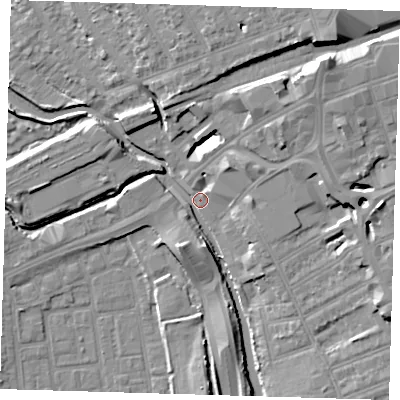 Shaded relief map of the ground around IG12AH, computed from Environment Agency LiDAR. The ground here sits at about 6 m above sea level and falls 13 m across the surrounding 800 m. Surface water reaching this point runs off ground lying to the east-north-east, 5.9 m higher.