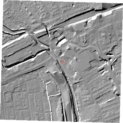 Shaded relief map of the ground around IG12BX, computed from Environment Agency LiDAR. The ground here sits at about 6 m above sea level and falls 13 m across the surrounding 800 m. Surface water reaching this point runs off ground lying to the north-east, 5.9 m higher.