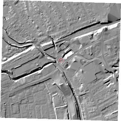 Shaded relief map of the ground around IG12DH, computed from Environment Agency LiDAR. The ground here sits at about 6 m above sea level and falls 13 m across the surrounding 800 m. Surface water reaching this point runs off ground lying to the north-east, 13.3 m higher.