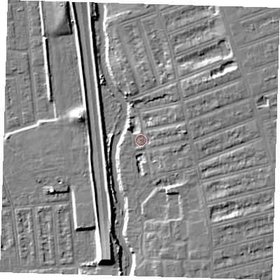 Shaded relief map of the ground around IG12HW, computed from Environment Agency LiDAR. The ground here sits at about 6 m above sea level and falls 9 m across the surrounding 800 m. Surface water reaching this point runs off ground lying to the east-north-east, 6.7 m higher.