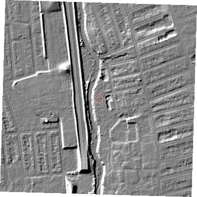 Shaded relief map of the ground around IG12HZ, computed from Environment Agency LiDAR. The ground here sits at about 6 m above sea level and falls 9 m across the surrounding 800 m. Surface water reaching this point runs off ground lying to the south-east, 2.6 m higher.