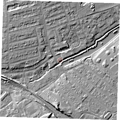 Shaded relief map of the ground around IG12PG, computed from Environment Agency LiDAR. The ground here sits at about 6 m above sea level and falls 9 m across the surrounding 800 m. Surface water reaching this point runs off ground lying to the south, 7.5 m higher.