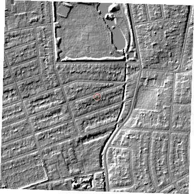 Shaded relief map of the ground around IG12TG, computed from Environment Agency LiDAR. The ground here sits at about 9 m above sea level and falls 6 m across the surrounding 800 m. Surface water reaching this point runs off ground lying to the north-west, 1.0 m higher.