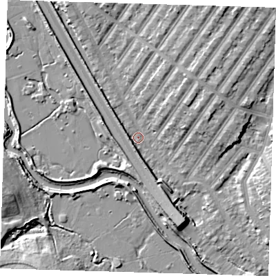 Shaded relief map of the ground around IG13TN, computed from Environment Agency LiDAR. The ground here sits at about 5 m above sea level and falls 9 m across the surrounding 800 m. Surface water reaching this point runs off ground lying to the north-east, 6.8 m higher.