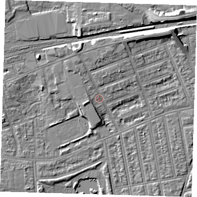 Shaded relief map of the ground around IG38AA, computed from Environment Agency LiDAR. The ground here sits at about 11 m above sea level and falls 9 m across the surrounding 800 m. Surface water reaching this point runs off ground lying to the north-north-east, 4.0 m higher.