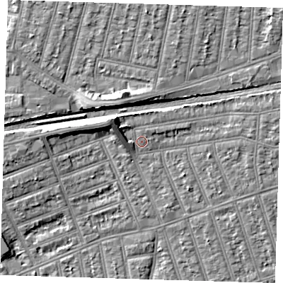Shaded relief map of the ground around IG38DH, computed from Environment Agency LiDAR. The ground here sits at about 12 m above sea level and falls 8 m across the surrounding 800 m. Surface water reaching this point runs off ground lying to the north-west, 5.1 m higher.