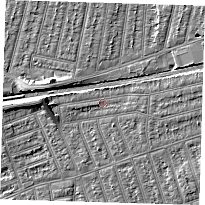 Shaded relief map of the ground around IG38DL, computed from Environment Agency LiDAR. The ground here sits at about 12 m above sea level and falls 8 m across the surrounding 800 m. Surface water reaching this point runs off ground lying to the east-north-east, 2.3 m higher.