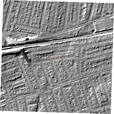 Shaded relief map of the ground around IG38DW, computed from Environment Agency LiDAR. The ground here sits at about 12 m above sea level and falls 8 m across the surrounding 800 m. Surface water reaching this point runs off ground lying to the east-north-east, 2.2 m higher.