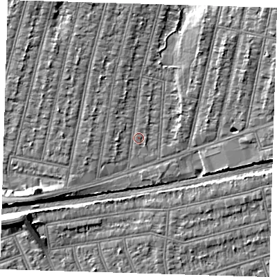 Shaded relief map of the ground around IG38PS, computed from Environment Agency LiDAR. The ground here sits at about 13 m above sea level and falls 7 m across the surrounding 800 m. Surface water reaching this point runs off ground lying to the north, 2.7 m higher.