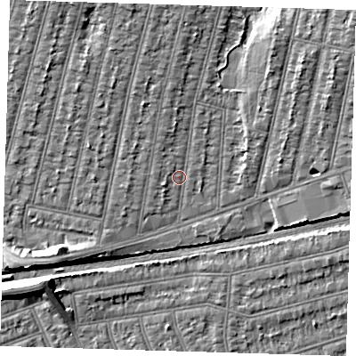 Shaded relief map of the ground around IG38PT, computed from Environment Agency LiDAR. The ground here sits at about 13 m above sea level and falls 7 m across the surrounding 800 m. Surface water reaching this point runs off ground lying to the north, 2.8 m higher.