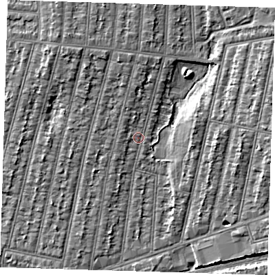 Shaded relief map of the ground around IG38PX, computed from Environment Agency LiDAR. The ground here sits at about 14 m above sea level and falls 7 m across the surrounding 800 m. Surface water reaching this point runs off ground lying to the north, 2.8 m higher.