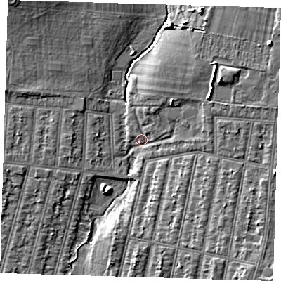 Shaded relief map of the ground around IG38UJ, computed from Environment Agency LiDAR. The ground here sits at about 16 m above sea level and falls 8 m across the surrounding 800 m. Surface water reaching this point runs off ground lying to the north-west, 7.3 m higher.