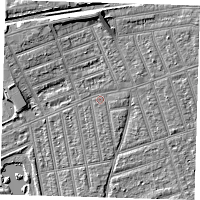 Shaded relief map of the ground around IG39JU, computed from Environment Agency LiDAR. The ground here sits at about 10 m above sea level and falls 9 m across the surrounding 800 m. Surface water reaching this point runs off ground lying to the north, 6.5 m higher.