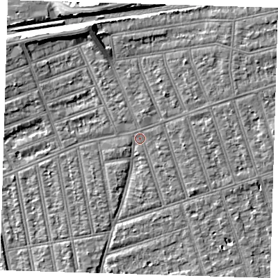 Shaded relief map of the ground around IG39LA, computed from Environment Agency LiDAR. The ground here sits at about 10 m above sea level and falls 8 m across the surrounding 800 m. Surface water reaching this point runs off ground lying to the east-north-east, 0.6 m higher.