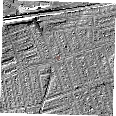 Shaded relief map of the ground around IG39TQ, computed from Environment Agency LiDAR. The ground here sits at about 11 m above sea level and falls 8 m across the surrounding 800 m. Surface water reaching this point runs off ground lying to the north-north-west, 5.9 m higher.