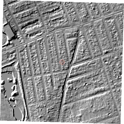 Shaded relief map of the ground around IG39YD, computed from Environment Agency LiDAR. The ground here sits at about 10 m above sea level and falls 6 m across the surrounding 800 m. Surface water reaching this point runs off ground lying to the north, 1.6 m higher.