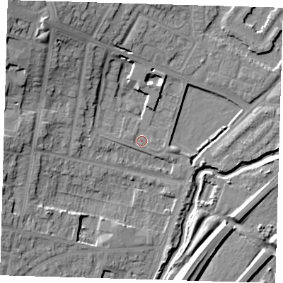 Shaded relief map of the ground around IG87BB, computed from Environment Agency LiDAR. The ground here sits at about 13 m above sea level and falls 19 m across the surrounding 800 m. Surface water reaching this point runs off ground lying to the west, 1.1 m higher.