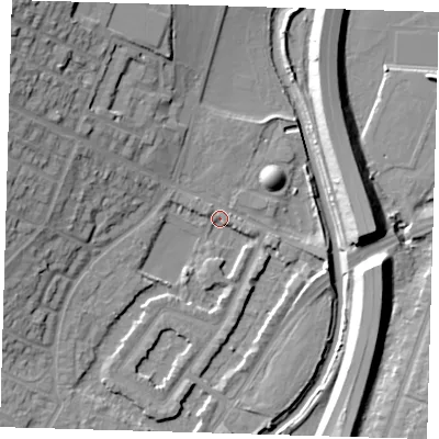 Shaded relief map of the ground around IG87JJ, computed from Environment Agency LiDAR. The ground here sits at about 13 m above sea level and falls 18 m across the surrounding 800 m. Surface water reaching this point runs off ground lying to the west-north-west, 13.6 m higher.