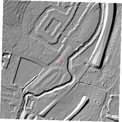 Shaded relief map of the ground around IG88PE, computed from Environment Agency LiDAR. The ground here sits at about 13 m above sea level and falls 12 m across the surrounding 800 m. Surface water reaching this point runs off ground lying to the south-west, 3.8 m higher.