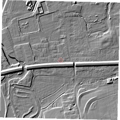 Shaded relief map of the ground around KT108AS, computed from Environment Agency LiDAR. The ground here sits at about 12 m above sea level and falls 10 m across the surrounding 800 m. Surface water reaching this point runs off ground lying to the west-south-west, 5.4 m higher.